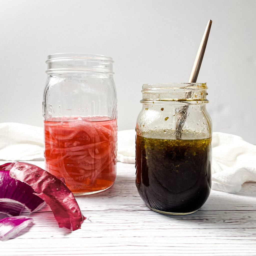 pickled red onions and basil balsamic vinaigrette in mason jars