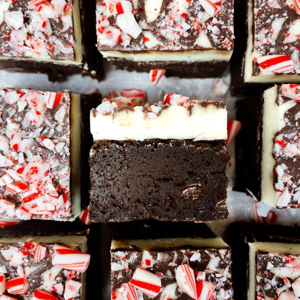 close up of a peppermint bark brownie on it's side.