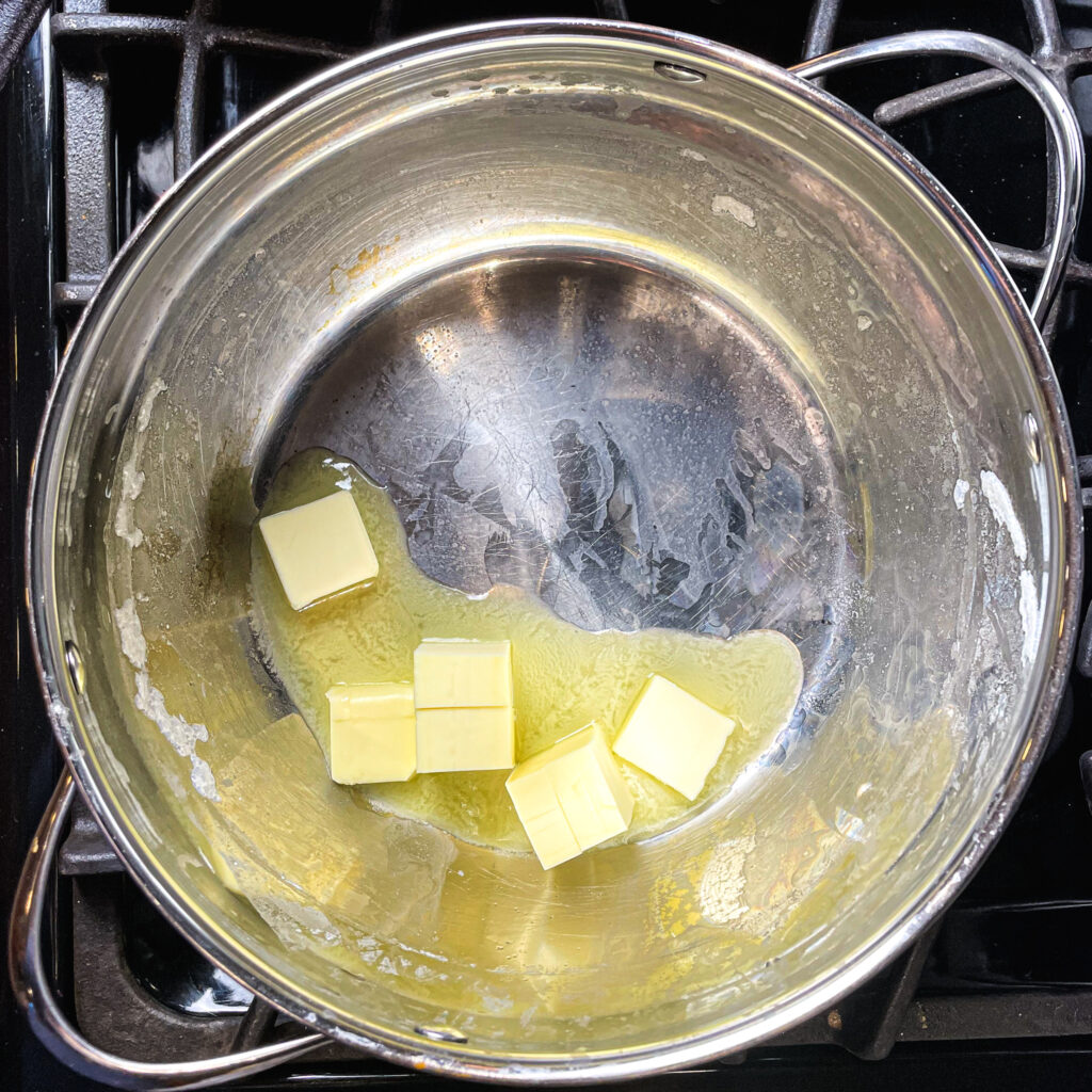 butter melting in the pot for potatoes