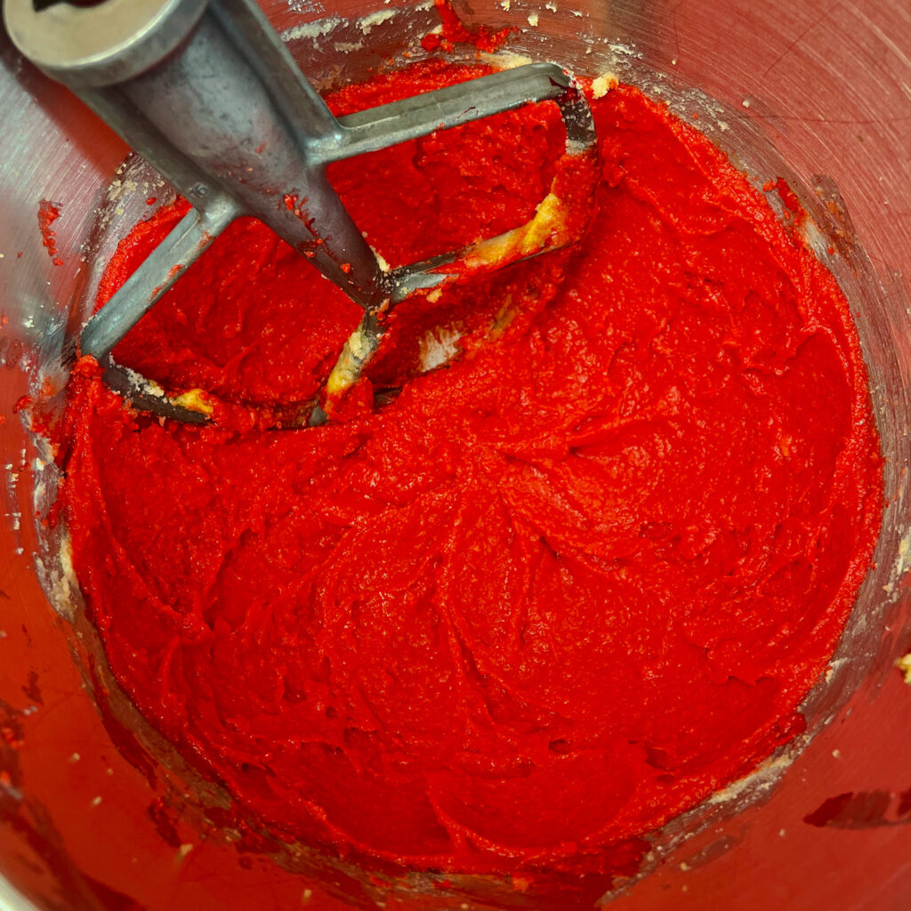 Wet ingredients for red velvet crumbl cookie dough creamed together