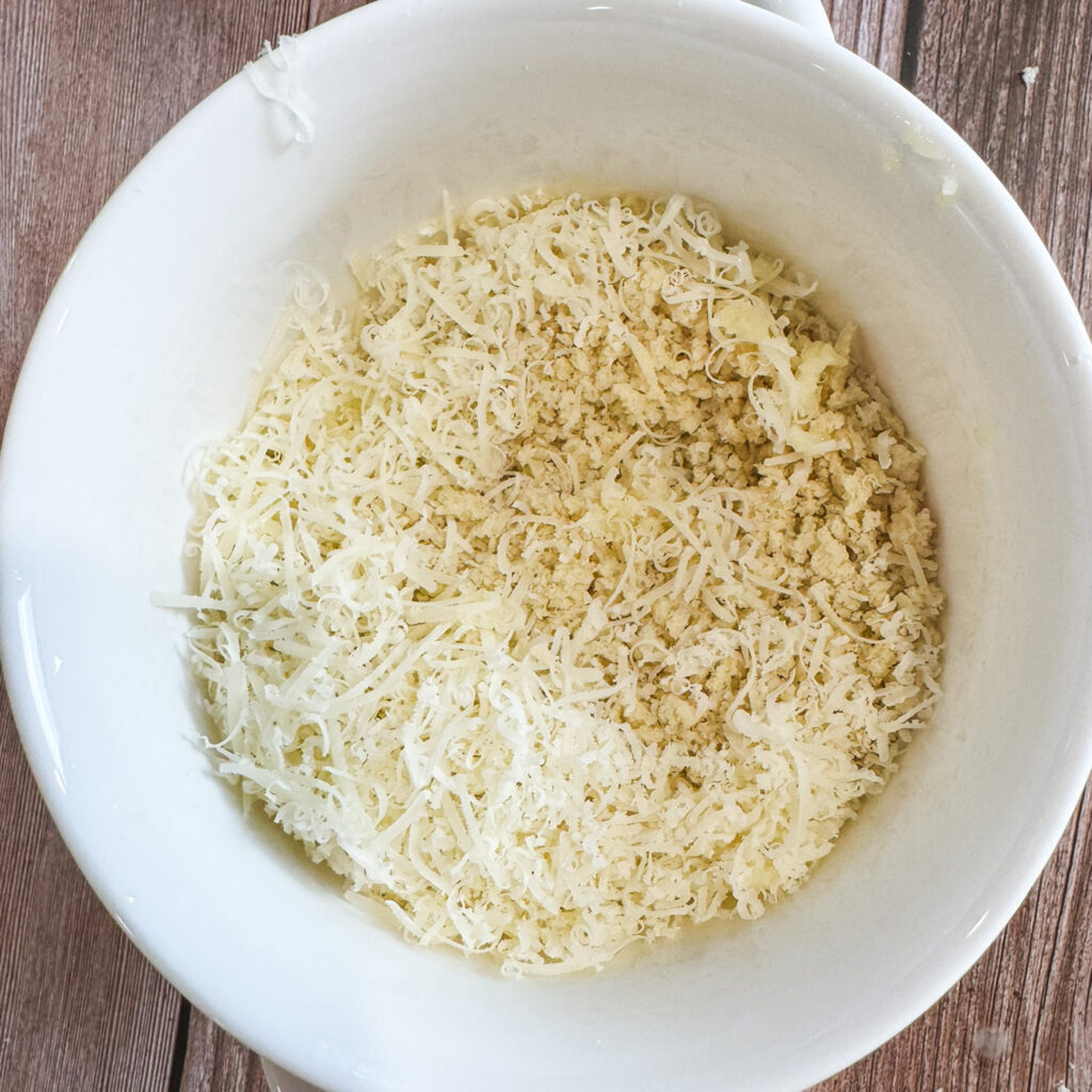 Panko breadcrumbs and grated Parmesan cheese mixed together in a bowl for a crispy, buttery topping to finish baked mac and cheese.