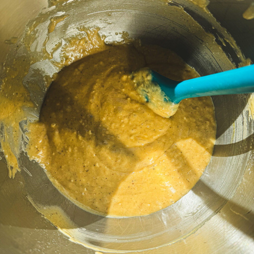 Brown butter apple cake batter mixed with sour cream, cinnamon and vanilla for a moist apple skillet cake.